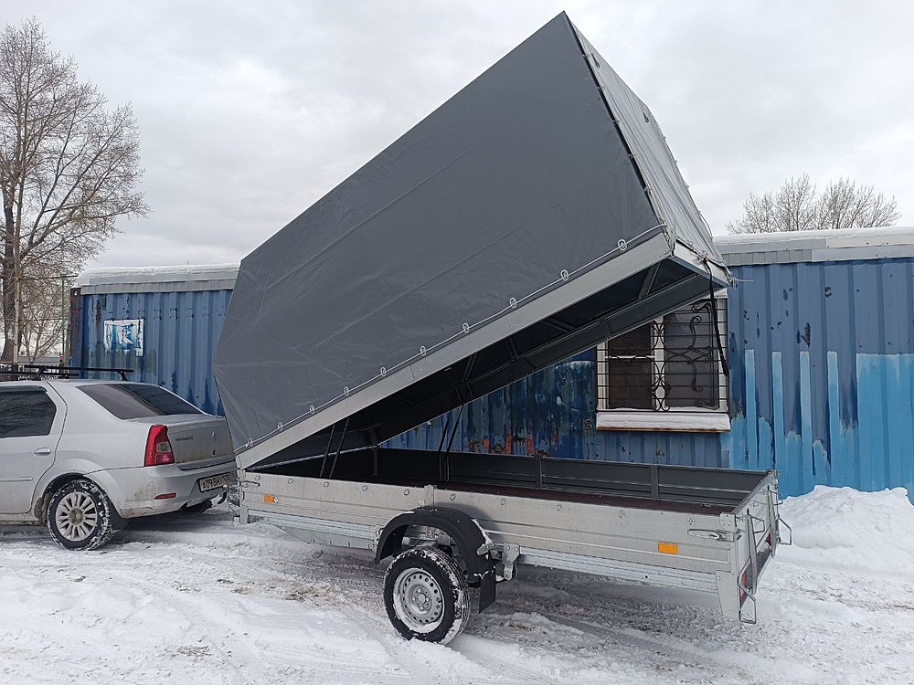 Легковой прицеп ССТ-7132-09 Тент 1,5 м подъемным механизмом.